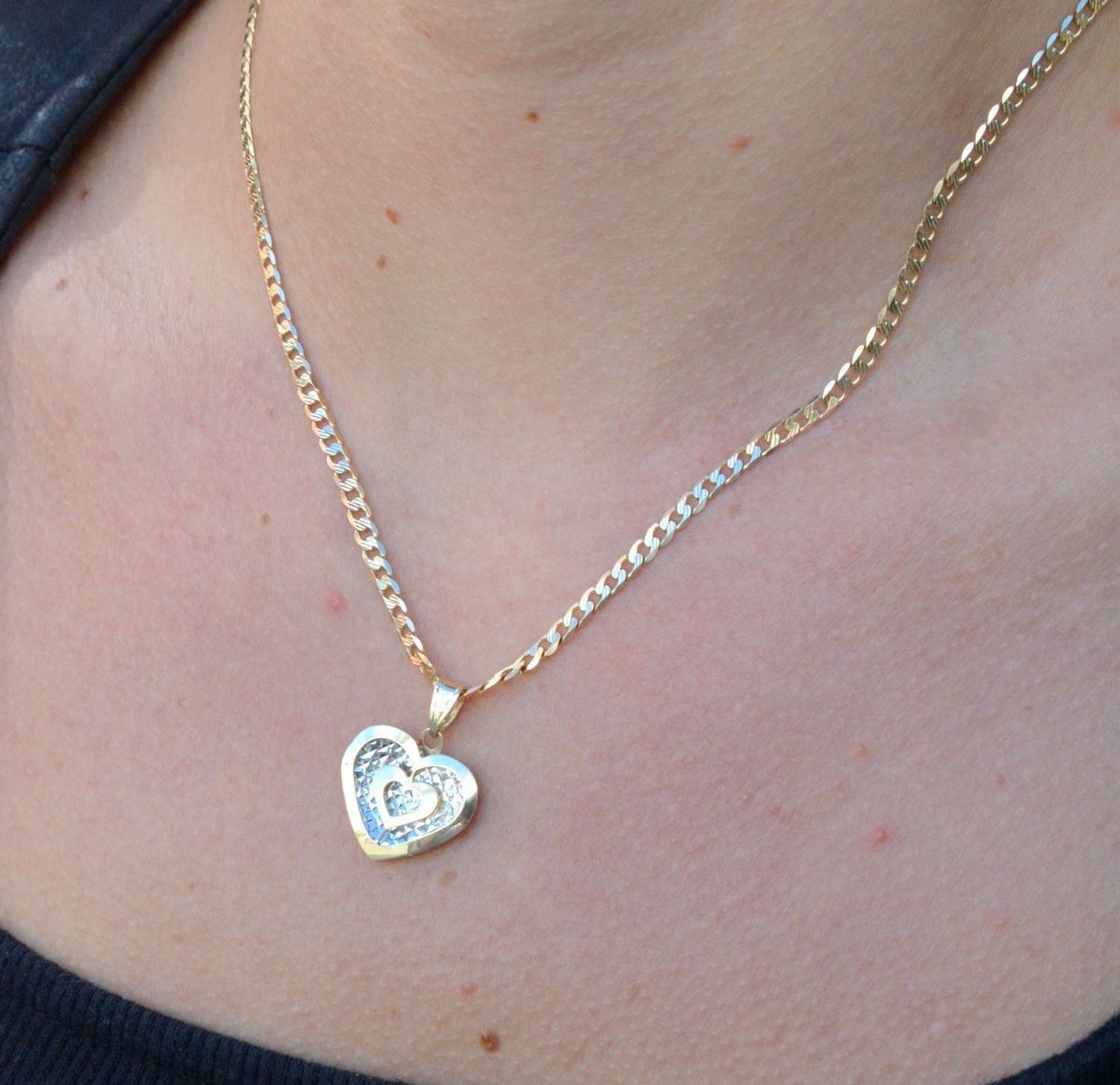 Złota zawieszka błyszczące serce próba 333 ZA 4216 333. . Piękna złota zawieszka w kształcie serca to śliczny dodatek, który odmieni każdą stylizację. Na prezent.jpg